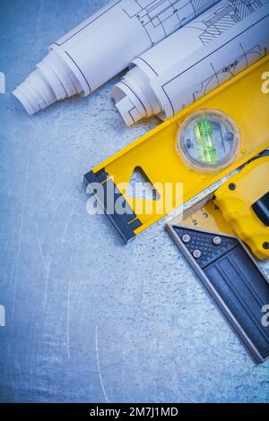 Square Ruler Consruction Construction plans measuring line square ruler and claw hammer on ...