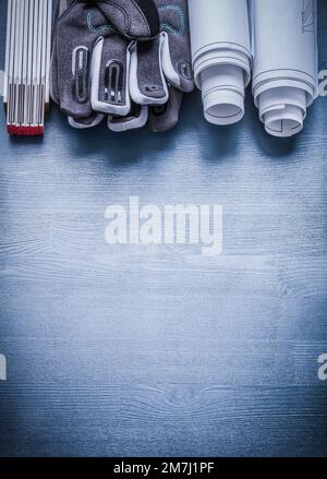 vertical view two rolls of blueprints on white wooden meter Stock Photo ...