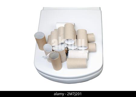Empty toilet paper rolls are in the bathroom, close up, isolated on a white background Stock Photo