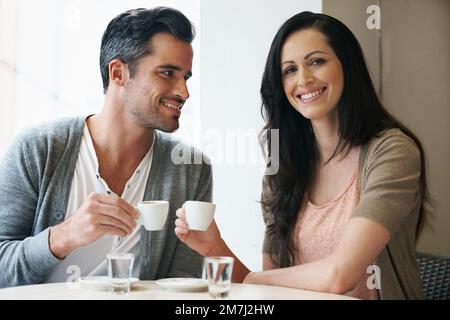 What a wonderful morning with my love. a young couple grabbing a cup of coffee together. Stock Photo