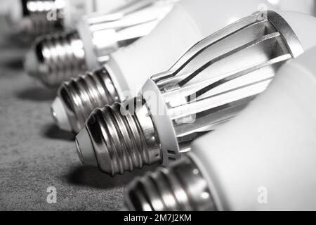 E27 base of the LED lamps with radiator on grey background Stock Photo