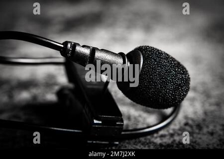 Close-up view of a lavalier microphone. Sound or voice equipment for recording Stock Photo