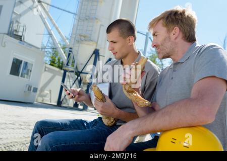 builders having a lunch break Stock Photo
