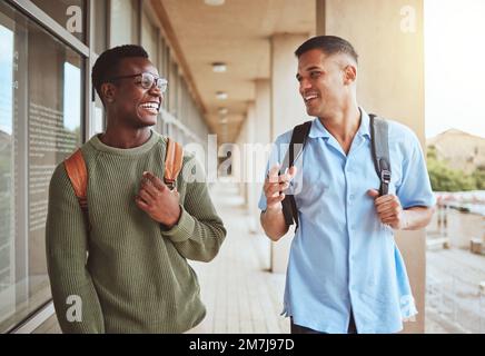 Men, students and friends with education and university, together talking and laughing with funny and study at college. Comedy, discussion and Stock Photo