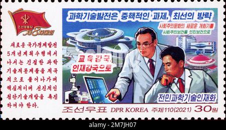 2021 North Korea postage stamp celebrating science and technology development for the 8th Congress of the Workers' Party of Korea. Stock Photo