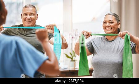 Physical therapy, stretching and senior couple with nurse teamwork, support and help in rehabilitation together. Elderly black people or friends smile Stock Photo