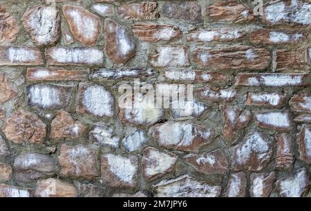 Stone wall texture background of grey brick stones. Stock Photo