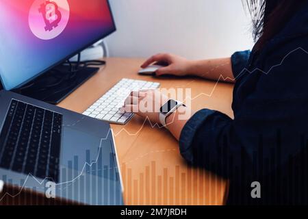 Unrecognizable business woman working on the computer, graphics added to the photo Stock Photo