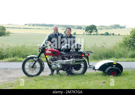 Jim and Maria Harris with their 1971 Triumph T100C Trophy 500cc and custom built trailer. Stock Photo