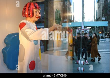 Creepy life-like robot of artist Yayoi Kusama spotted painting shop window  in New York
