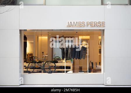 January 3, 2023, Tokyo, Japan: A James Perse store in Tokyo...James Perse boutiques are a luxury clothing and lifestyle brand that are known for their casual and sophisticated clothing line, made out of high-quality fabrics and minimalistic designs. They offer a range of items, from men's and women's clothing to furniture, home decor, and accessories. The boutiques can be found around the world, including United States and Europe...Marunouchi is a bustling central business district in central Tokyo. It is home to many of the country's largest corporations, including the headquarters of Mitsubi Stock Photo