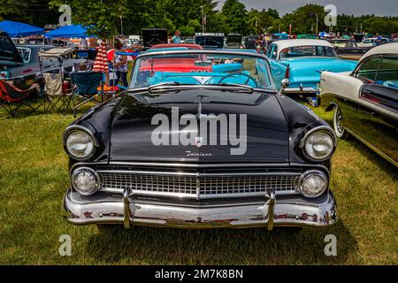 Iola, WI - July 07, 2022: High perspective front view of a 1955 Ford Fairlane Sunliner Convertible at a local car show. Stock Photo