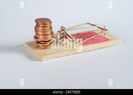 Risk management business concept.Mouse trap and stack of money,careful strategy development and leadership concept, light background free copy space Stock Photo