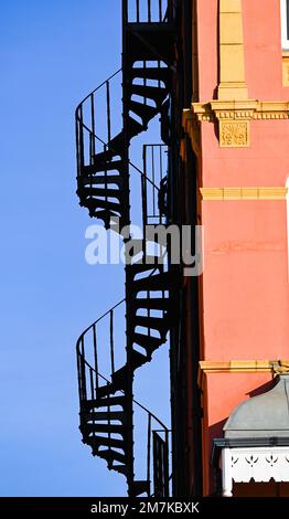 Fire escape stairs on outside of Kings Gardens Hove properties on seafront , Sussex , England , UK Stock Photo