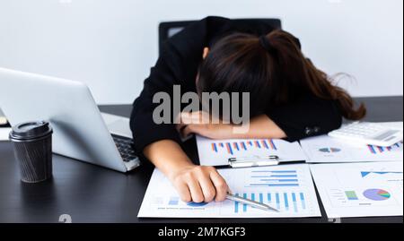 Financial accountant works on analyzing and summarizing the company's incomes and expenses in real estate and account management, causing her to get t Stock Photo