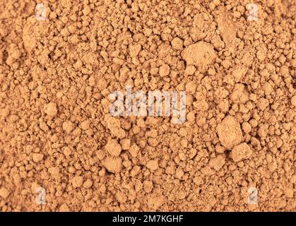 Full frame of cocoa powder as abstract background. Texture of cocoa powder. Stock Photo