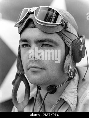 World War II (WWII) era photograph of US Marine Corps (USMC) First Lieutenant (1LT) William N. Case, Marine Fighter Squadron 214 (VMF-214)'Black Sheep'taken at Russell Islands, October 5, 1943. 1LT Case is an Ace Pilot credited with 8 kills. State: Rusell Islands Country: Solomon Islands (SLB) Stock Photo