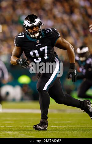 Philadelphia, Pennsylvania, USA. 21st Nov, 2021. New Orleans Saints  quarterback Trevor Siemian (15) throws the ball while under pressure by  Philadelphia Eagles defensive tackle Javon Hargrave (97) during the NFL game  between