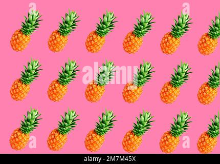 Pineapple on red pastel color background.Nature and holiday summer concepts. Stock Photo