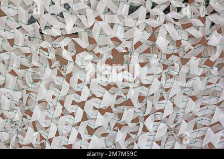 Winter camouflage netting for soldiers of the Ukrainian army Stock Photo