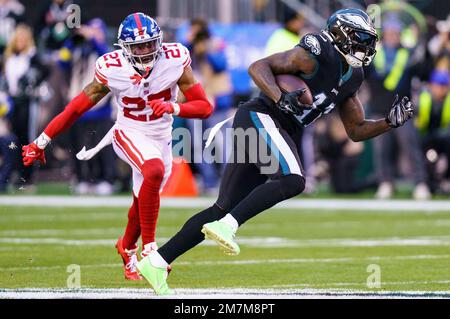 Seattle Seahawks wide receiver Deion Branch is tackled by New York Giants  safety Jason Bell after Branch made a catch in the first quarter of a NFL  football game Sunday, Sept. 24