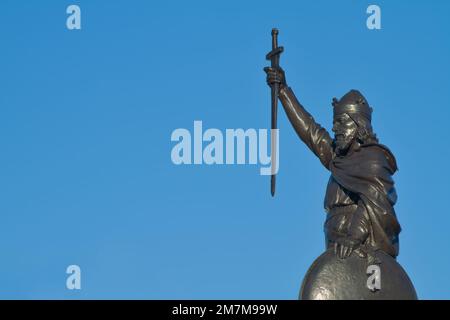 Side View Of The Bronze Statue Of King Alfred The Great Holding A Sword Downwards, The Broadway, Winchester, UK Stock Photo