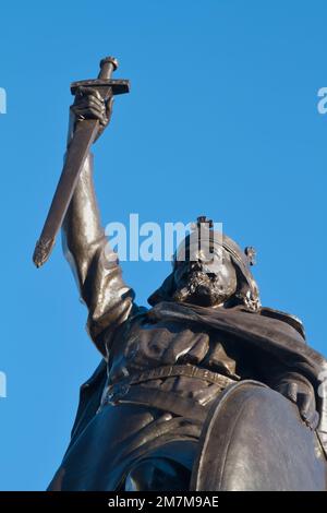 View Looking Up The Bronze Statue Of King Alfred The Great Holding A Sword Downwards, The Broadway, Winchester, UK Stock Photo