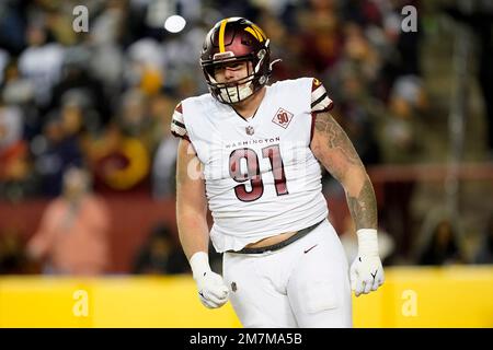 LANDOVER, MD - JANUARY 01: Washington Commanders defensive tackle John  Ridgeway (91) looks on during the Cleveland Browns game versus the Washington  Commanders on January 01, 2023, at FedEx Field in Landover