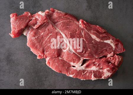 raw meat on a dark background Stock Photo