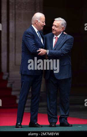 Mexico City, Mexico. 09th Jan, 2023. U.S President Joe Biden, left, and Mexican President Andres Manuel Lopez Obrador embrace during the arrival ceremony before the North American Leaders Summit at the Palacio Nacional, January 9, 2023 in Mexico City, Mexico. Credit: Presidencia de la Republica Mexicana/Mexican Presidents Office/Alamy Live News Stock Photo