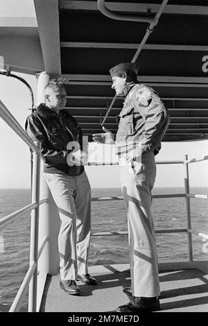 Vice Admiral John J. Shanahan, Commander, US Second Fleet, left, meets with Rear Admiral Frederick F. Palmer, Commander, Amphibious Group Two, aboard their flagship, the amphibious command ship USS MOUNT WHITNEY (LCC 20) en route to the allied Exercise TEAM WORK '76. The exercise is scheduled for September 15-24. Subject Operation/Series: TEAM WORK '76 Country: Unknown Stock Photo