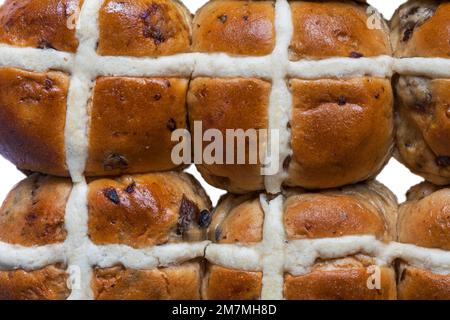 mini luxury fruited hot cross buns from M&S - rich & aromatic packed full of juicy fruits mixed peel and a unique blend of warming spices Stock Photo