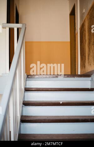 Staircase in a run down apartment building in Germany Stock Photo