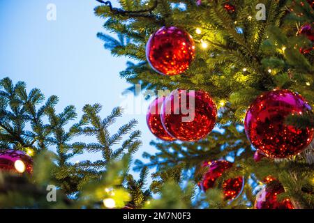 Christmas balls, red Christmas tree balls on a Christmas tree, detail Stock Photo