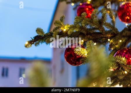 Christmas balls, red Christmas tree balls on a Christmas tree, detail Stock Photo