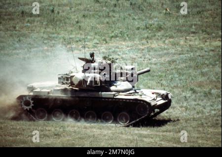 An M60A2 Main Battle Tank maneuvers on a firing range during a ...