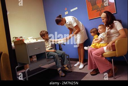 A nurse assists patients prior to treatment in the hyperbaric chamber in the Hyperbaric Medicine Division, School of Aerospace Medicine. Base: Brooks Air Force Base State: Texas (TX) Country: United States Of America (USA) Stock Photo