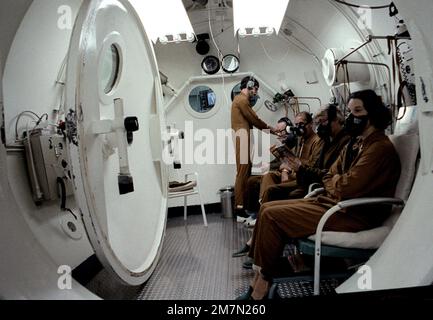 Patients are being treated in the hyperbaric chamber in the Hyperbaric Medicine Division, School of Aerospace Medicine. Base: Brooks Air Force Base State: Texas (TX) Country: United States Of America (USA) Stock Photo