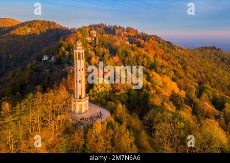 Aerial view of the Faro Voltiano (Volta Lighthouse) of Brunate overlooking Como and Como Lake in autumn. Brunate, Province of Como, Lombardy, Italy, Europe. Stock Photo