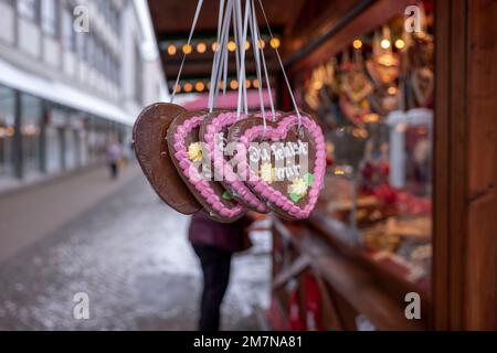 Gingerbread hearts at a Christmas market on the day in December. Stock Photo