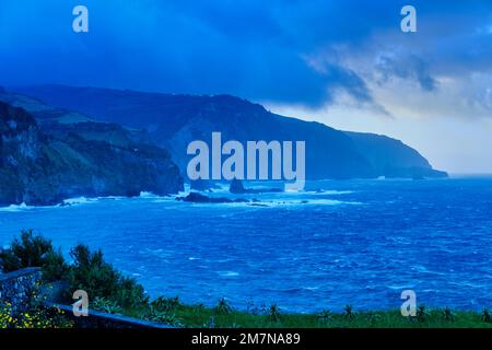 The northeast coast of Flores island on a stormy day. Azores islands, Portugal Stock Photo