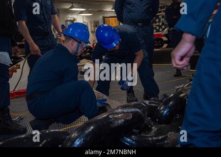 The forecastle and anchor chains aboard the USS Midway Aircraft Carrier ...