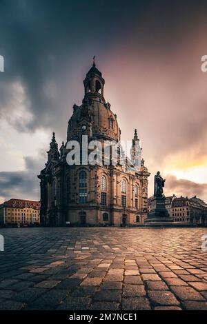 Historic city center, romantic sunrise at Neumark with famous Frauenkirche in Dresden, Saxony, Germany Stock Photo