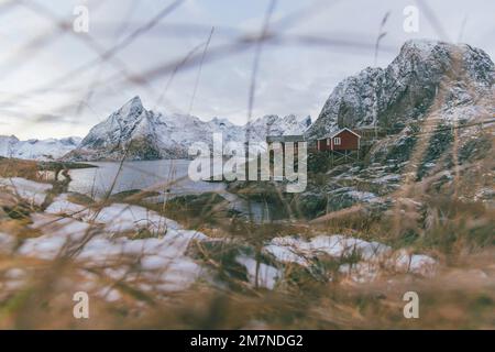 Hamnoy in Lofoten, fishing village, Norway, with red rorbu houses in winter Stock Photo