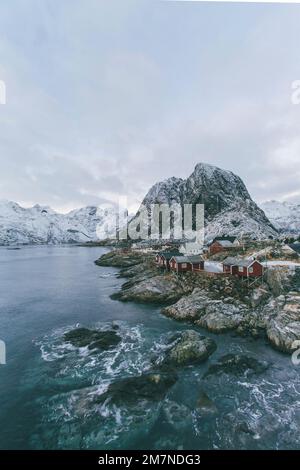 Hamnoy in Lofoten, fishing village, Norway, with red rorbu houses in winter Stock Photo