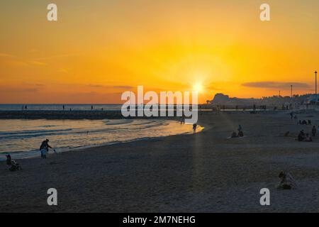 Sunset on the Spanish beach of Sitges, Catalonia, Spain. Stock Photo