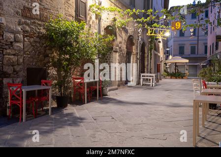 Alley in the old town in the morning, Grosseto, Tuscany, Italy Stock Photo