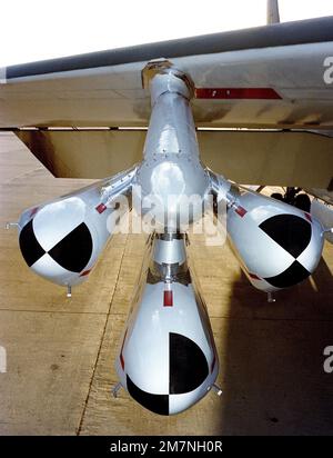 A close-up view of a AGM-109 Tomahawk air-launched cruise missile loaded on a B-52 Stratofortress aircraft. Country: Unknown Stock Photo