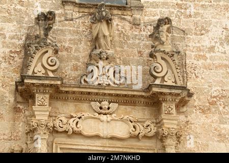 Felline, Italy. Exterior view of Chiesa di San Leucio, built in Baroque style in the 14th century. Details of the relief architrave. Stock Photo