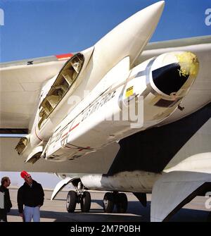 A close-up view of an AGM-86 air-launched cruise missile mounted on a B-52 Stratofortress aircraft wing pylon for an icing test mission. Base: Hill Air Force Base State: Utah (UT) Country: United States Of America (USA) Stock Photo